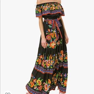 New with out tags. Large Fiesta over the shoulder long dress. Never worn